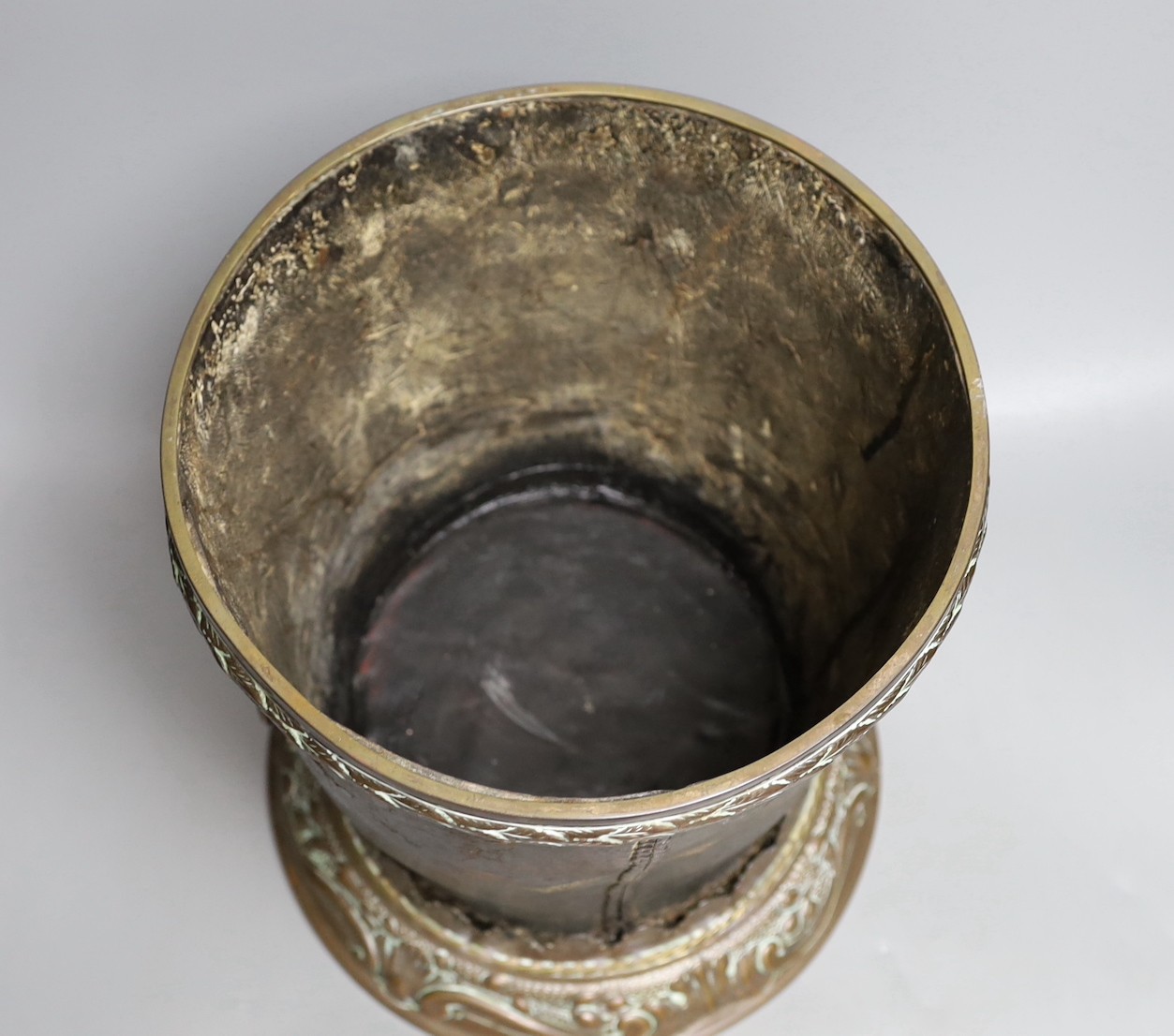 A George III leather fire bucket dated 1800, with later 19th century mounts, inscribed 'GR 1800 Pavilion' (cut down), 27cm tall